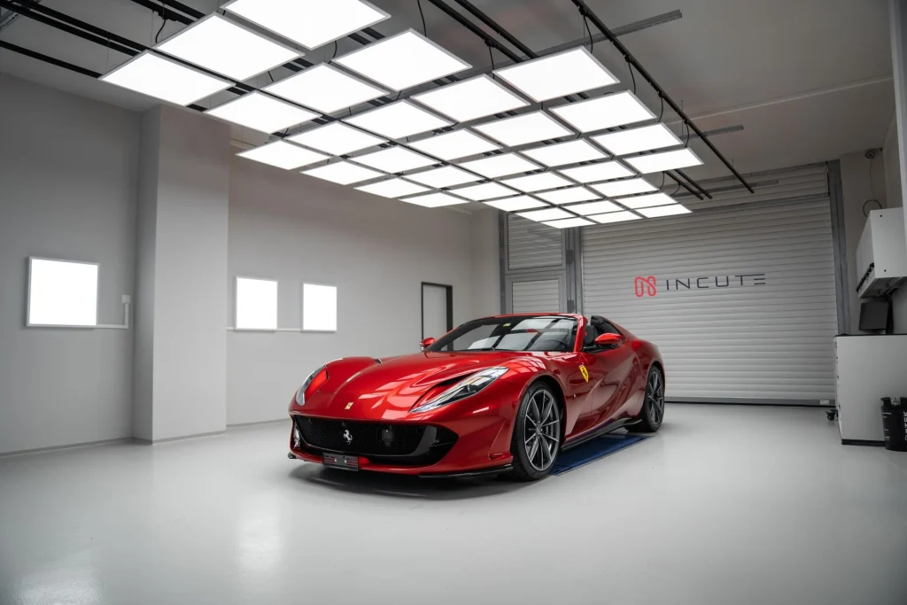Red Ferrari 812 GTS convertible in the INCUTE studio